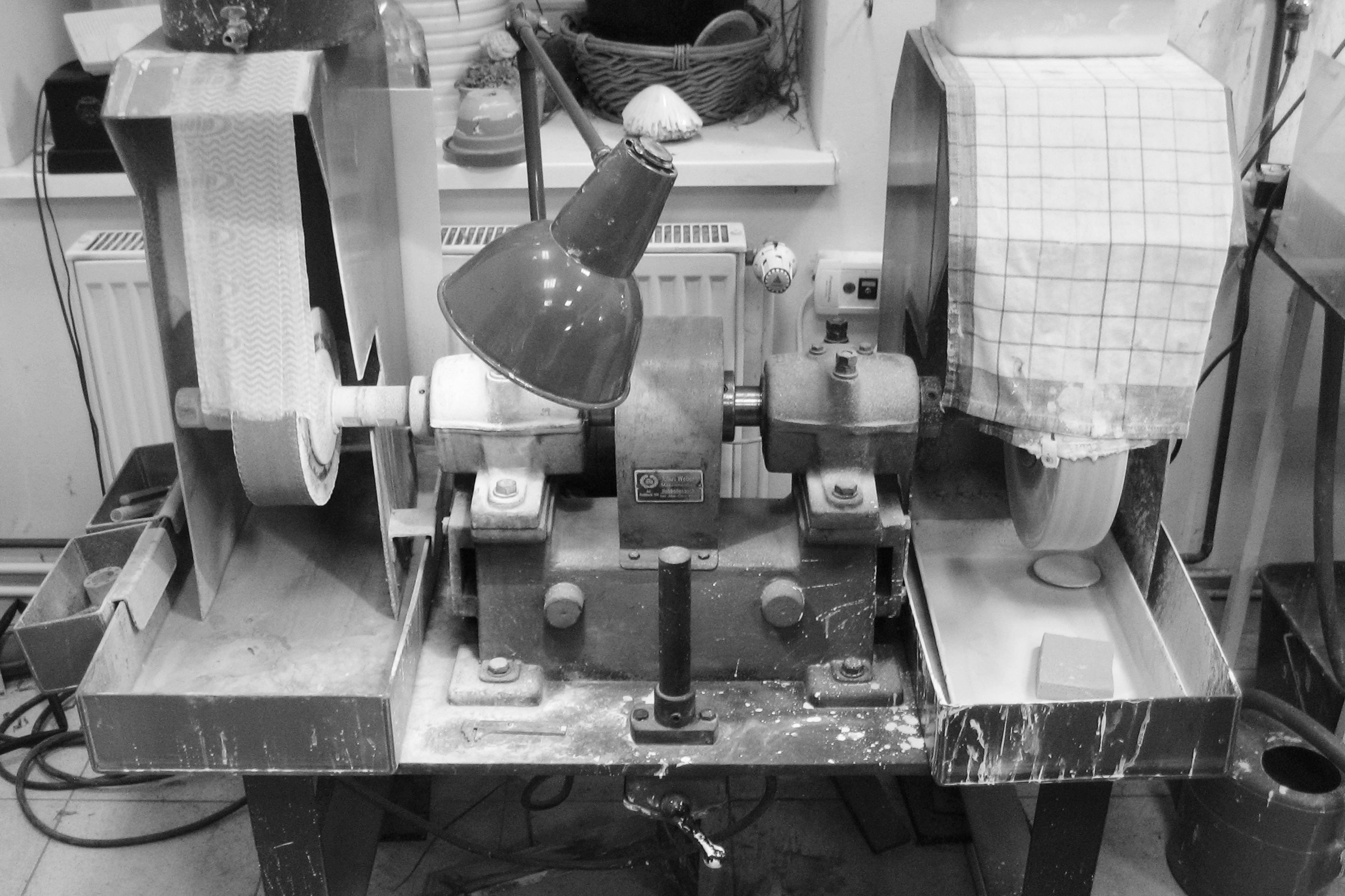 old and heavy stone-grinding and polishing maschine